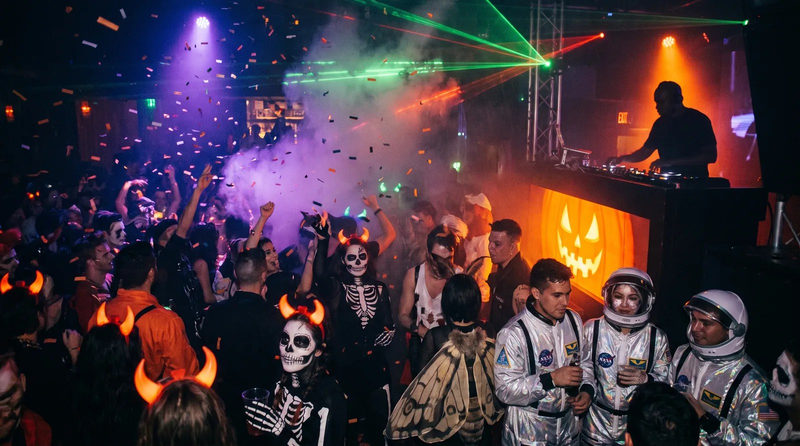 Toronto Halloween hip-hop party — costume crowd with DJ